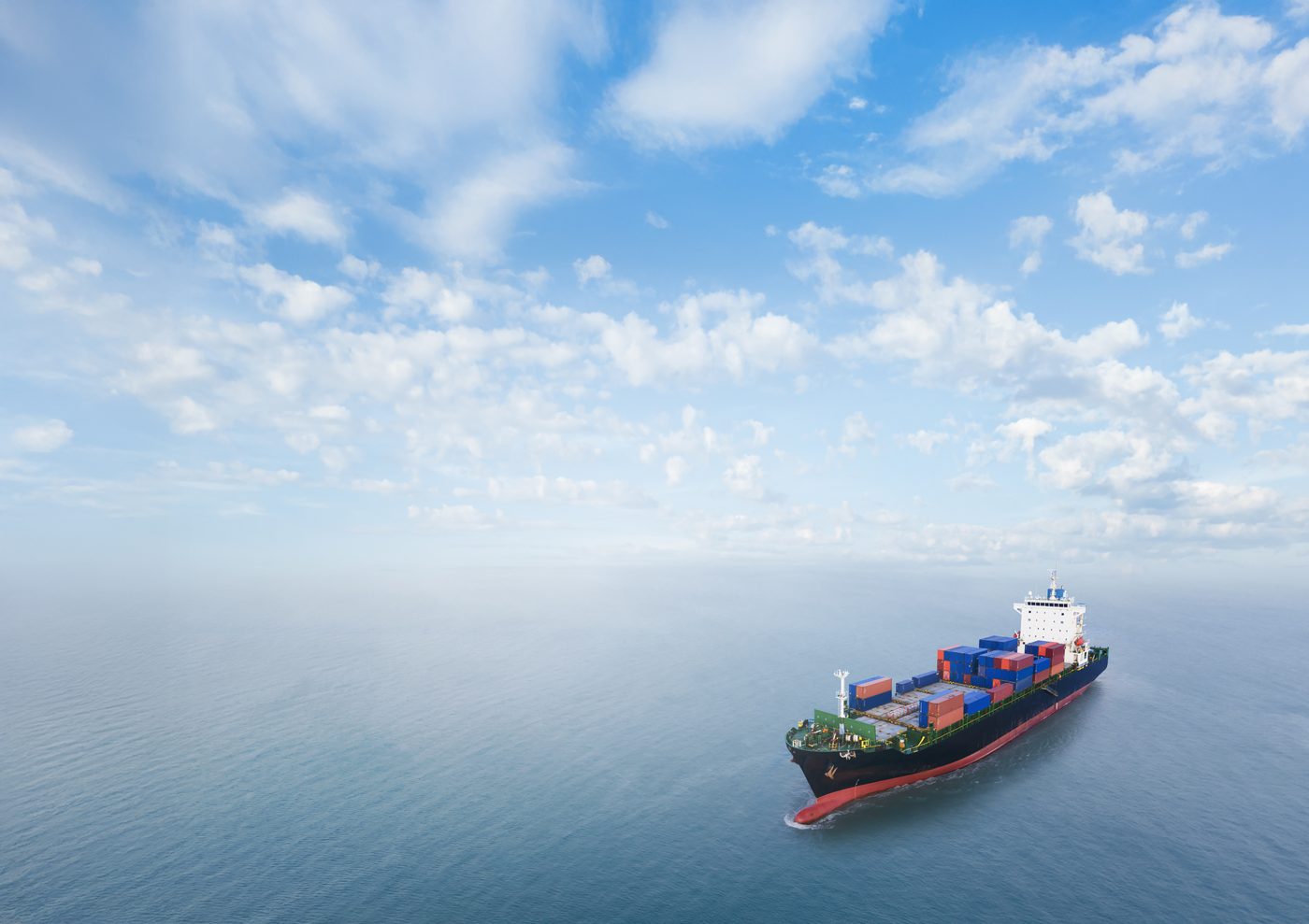 A container ship sailing on calm open sea